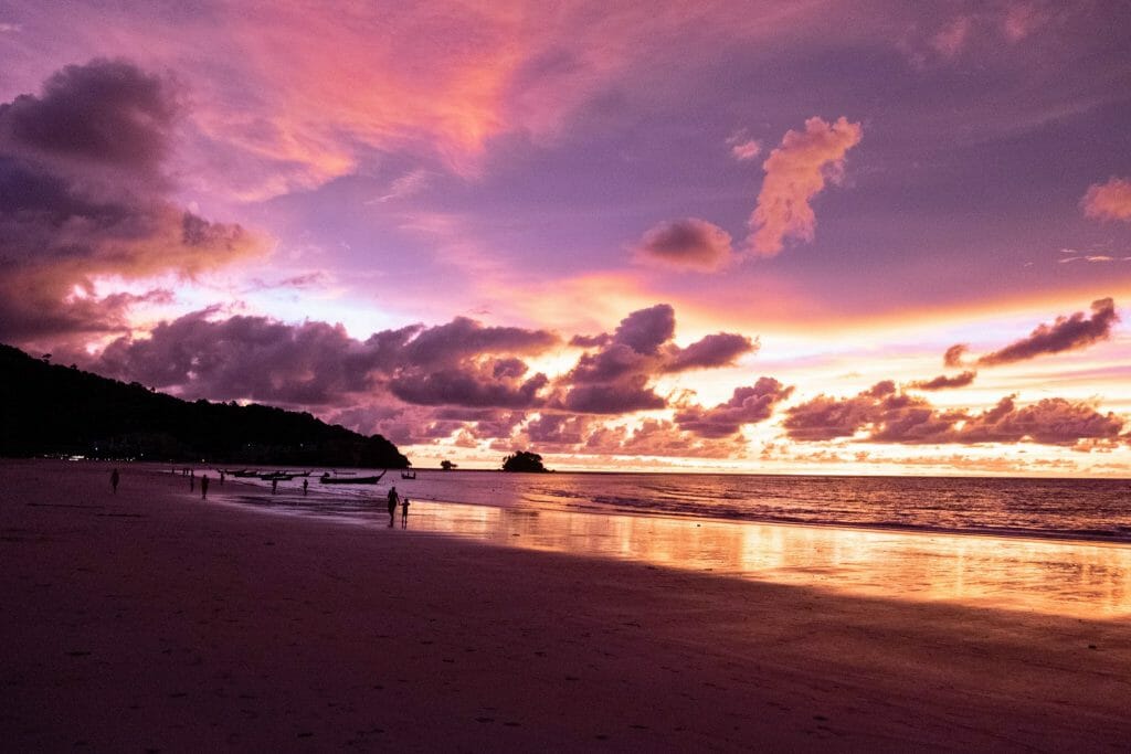 pink and purple sunset over naiyang beach