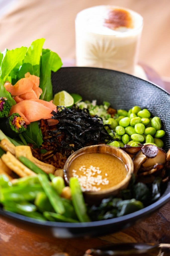 Bowl with greens and sauce at Shady Shack