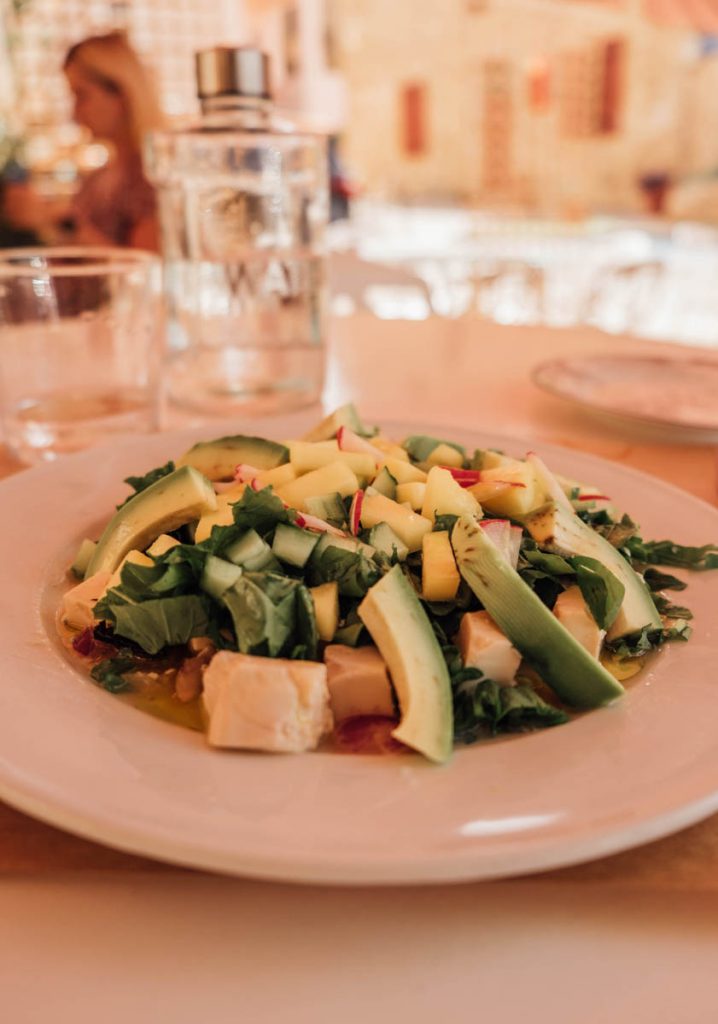 Plate with tofu and avocado at Pulse