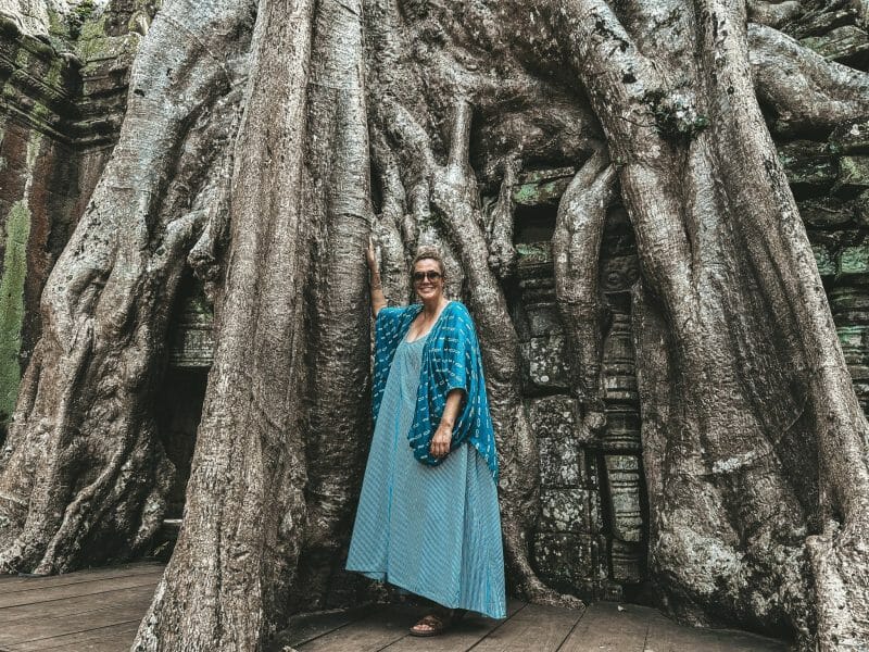 Annika Ziehen at Angkor Wat temple with overgrown tree