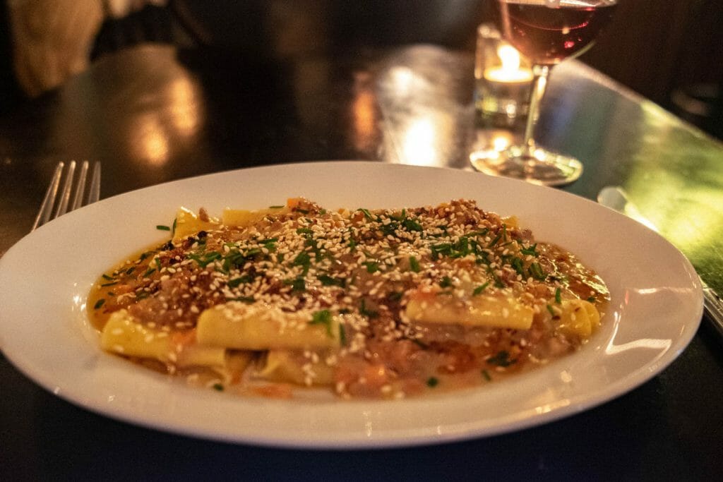 Pasta dish at Mosto on a white plate